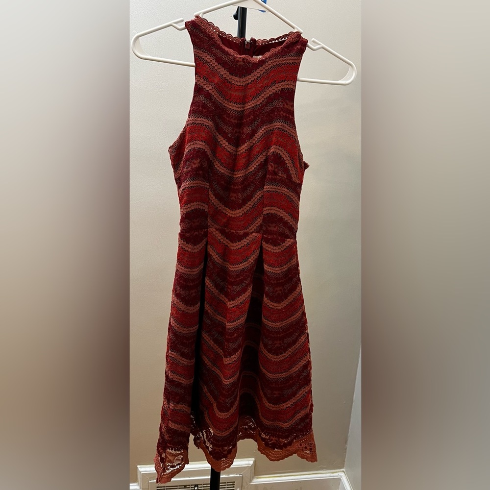Francesca’s dress for women and girls zipper, and lined. Size XXS